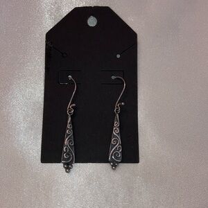 Sterling silver drop pierced earrings.  Drop is 1.75”.  New.